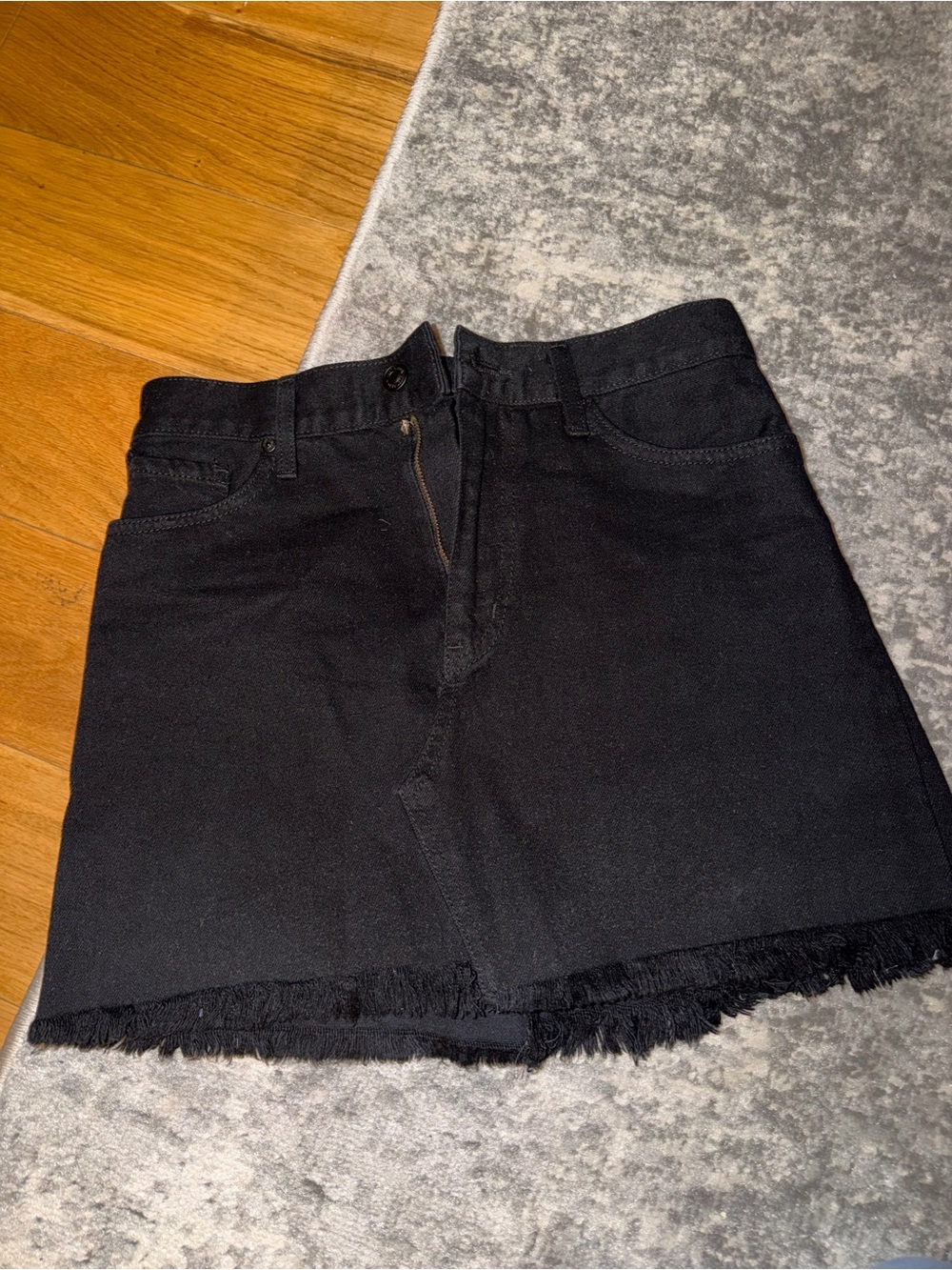 Black denim skirt